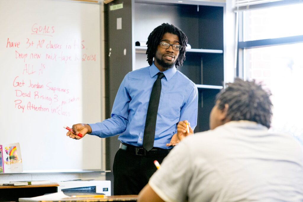 A teacher in front of a classroom