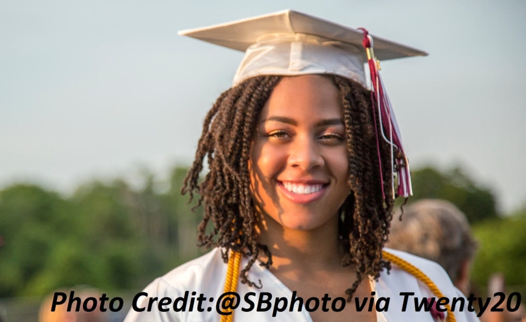 Black girl smiling on graduation day