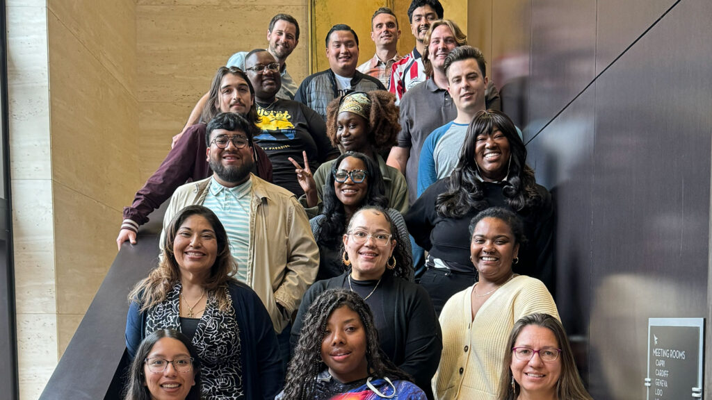 A group of college students standing on a stairwell