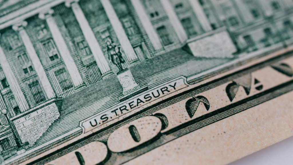 Extreme close up of a dollar banknote showing US Treasury on the bill